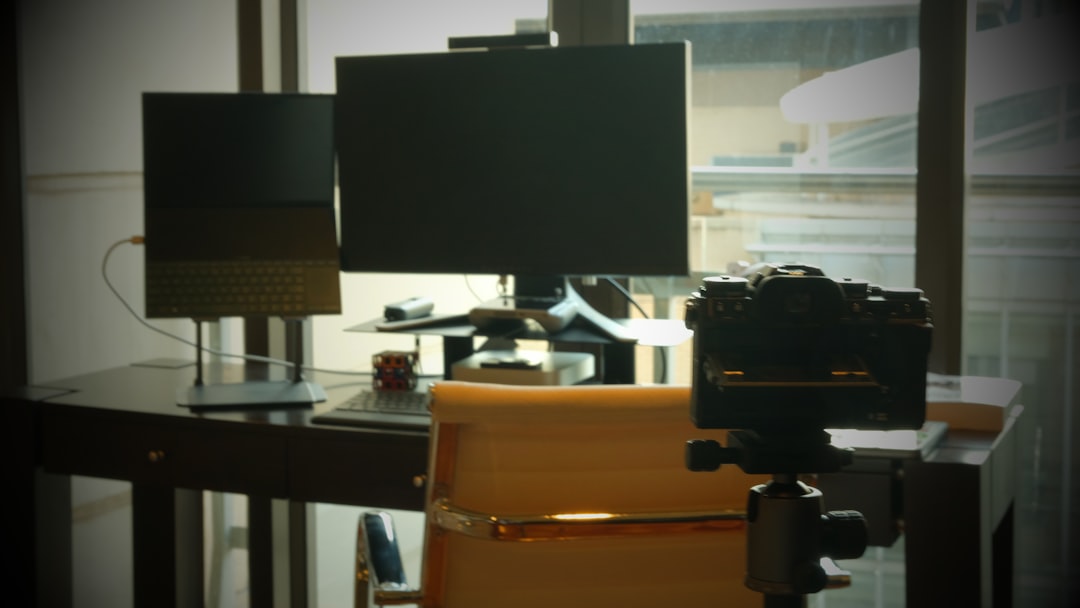 a camera sitting on top of a chair next to a window — What to Wear on a Video Call: The Complete Guide